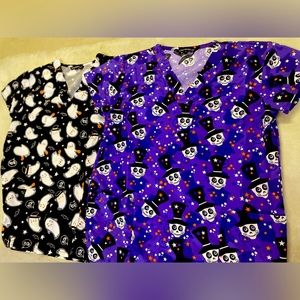 Lot of 2 Cassandra O Halloween themed scrub tops.
